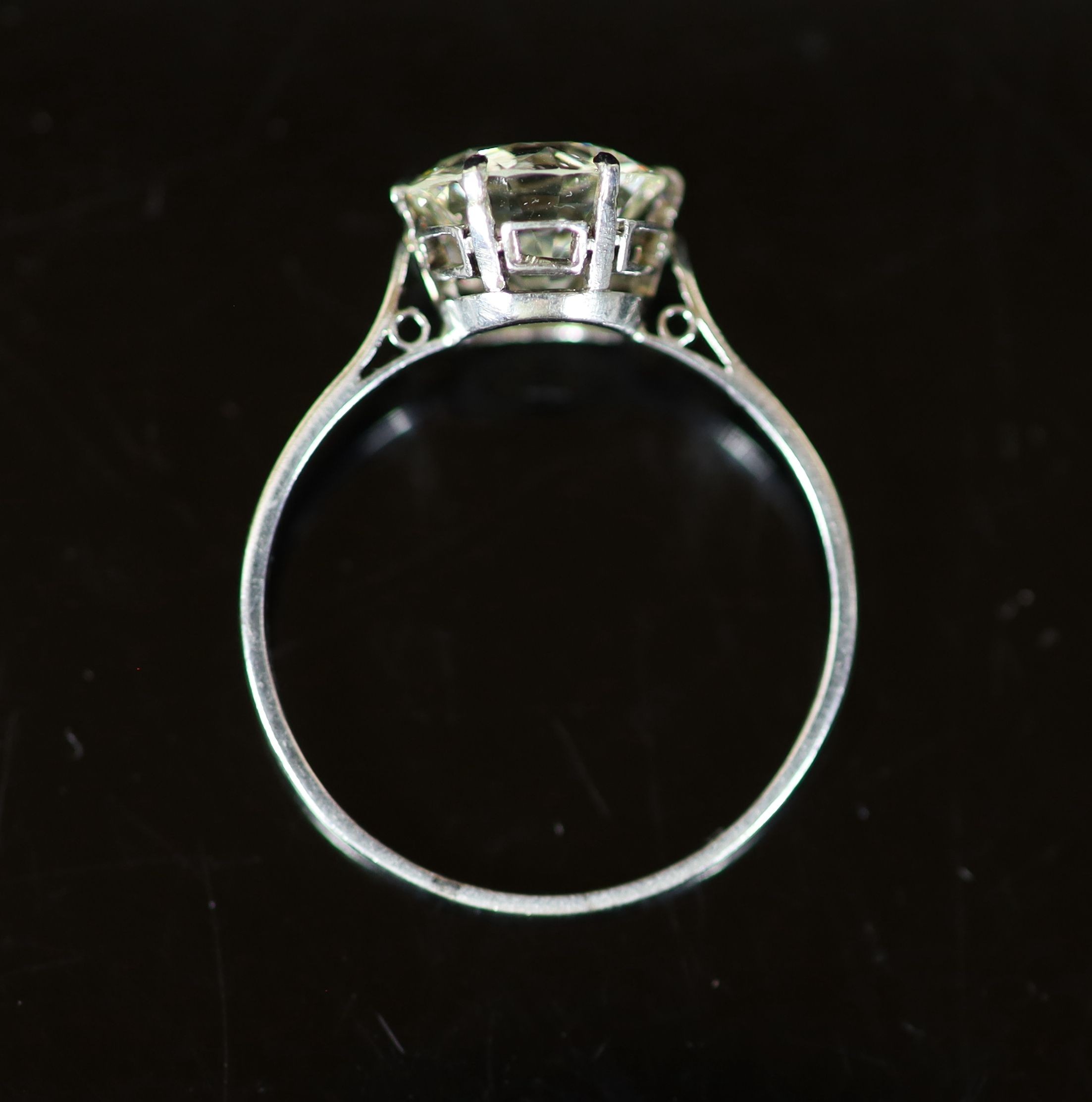 A platinum and solitaire diamond ring